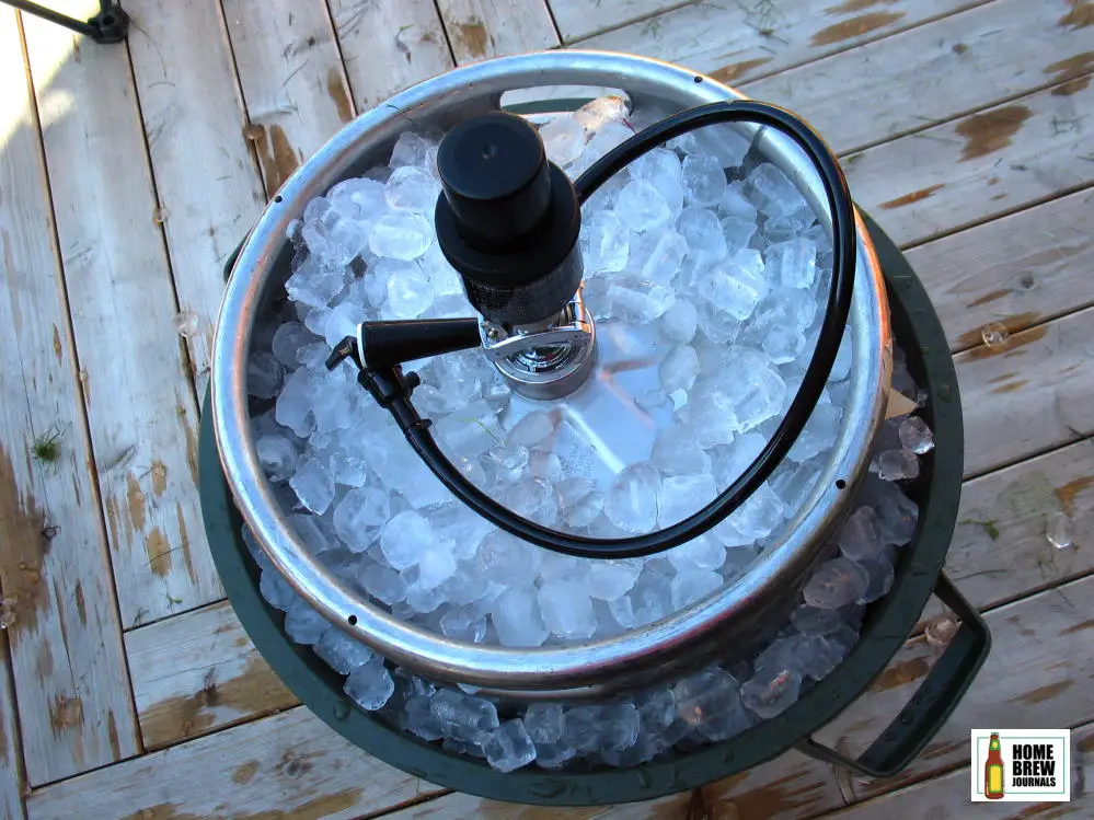 A beer keg in a trash can full of ice, photo to illustrate how to keep a keg cold without a kegerator